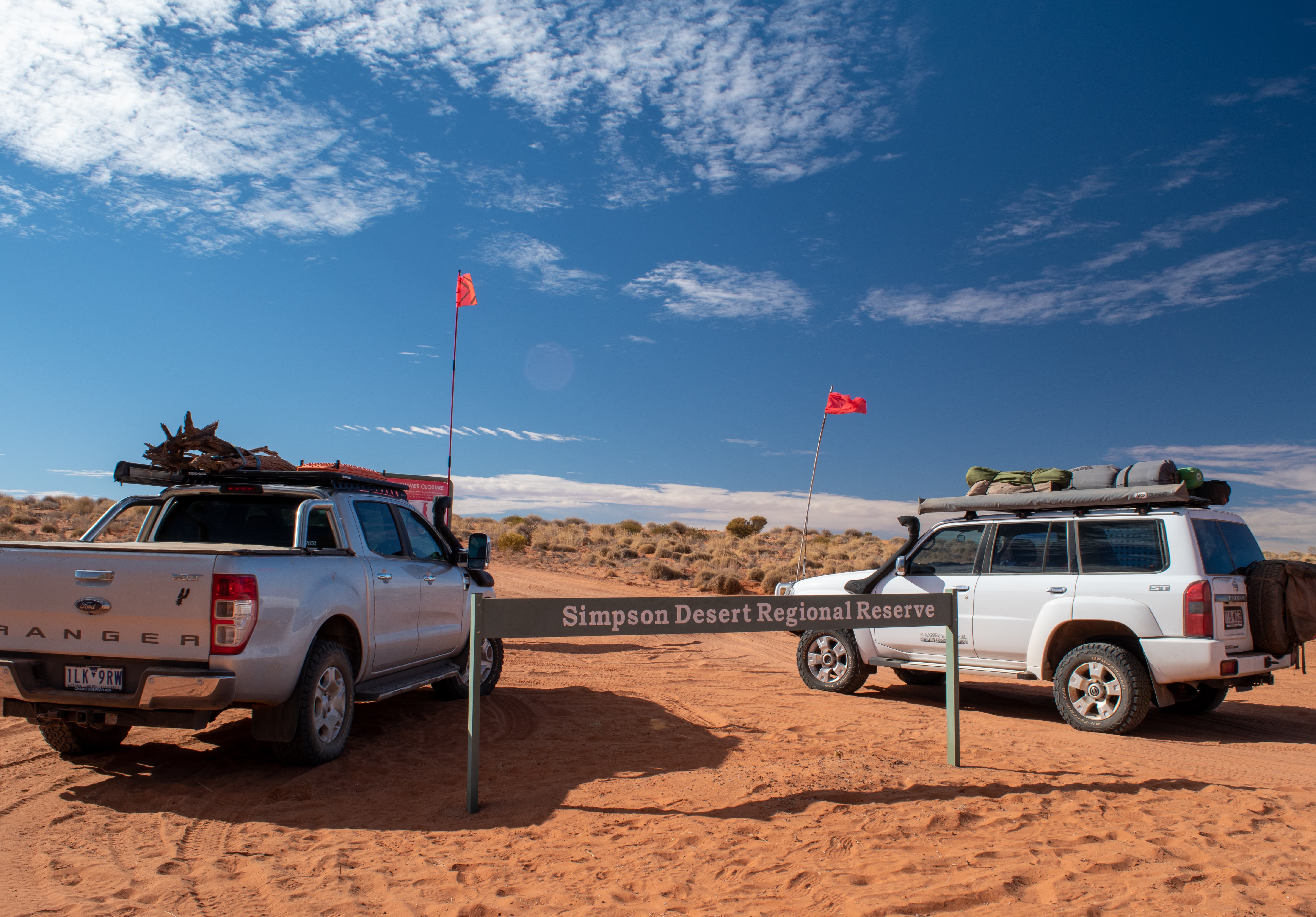 2 four wheel drive cars at the Simpson Desert Regional Reserve, South Australia